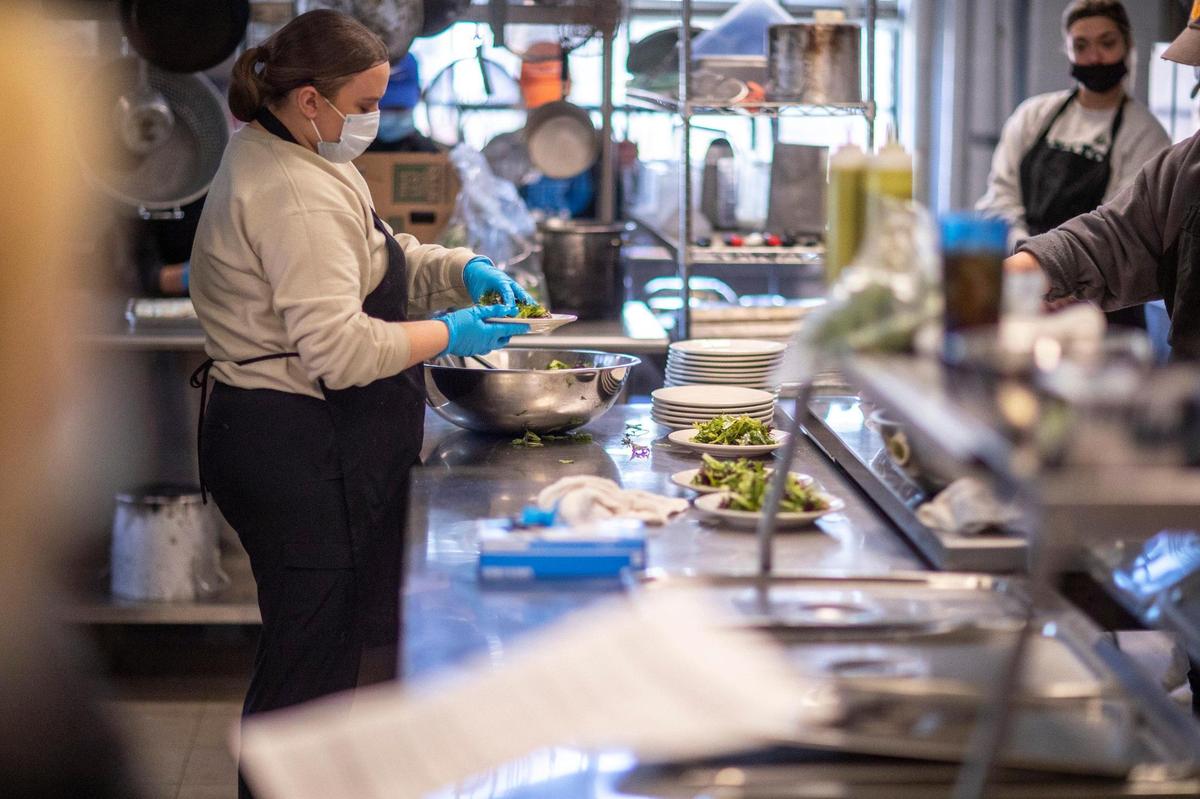 Students prepare salads for diners at the Lemon Tree, which provides real world, science-based experiences to UK students in the Quantity Food Production class, a capstone course for dietetics and hospitality, management and tourism undergraduate students.