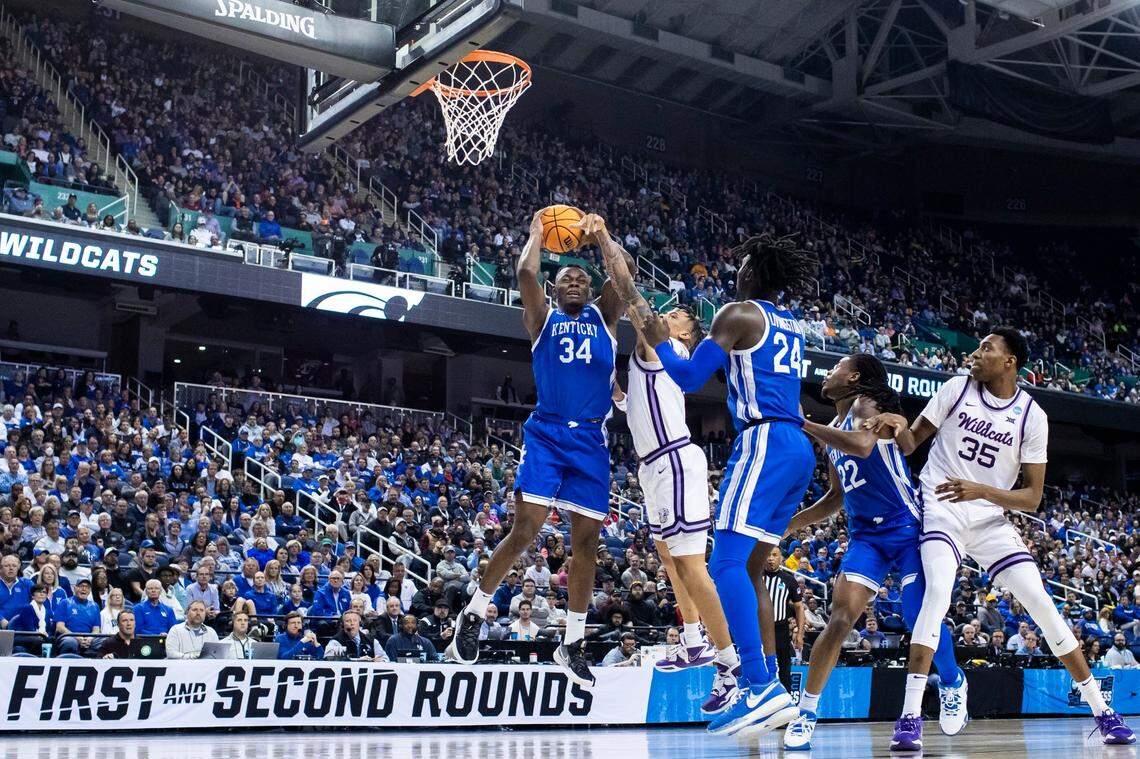 Kentucky forward Oscar Tshiebwe (34) grabs a rebound against Kansas State forward Keyontae Johnson during Sunday’s NCAA Tournament game.