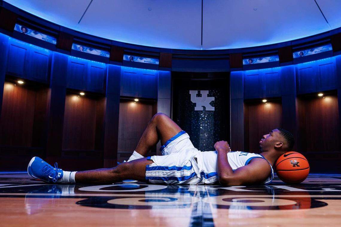 Lamont Butler poses for a photo in the UK basketball locker room at Rupp Arena while visiting campus after his commitment to the Wildcats this spring.