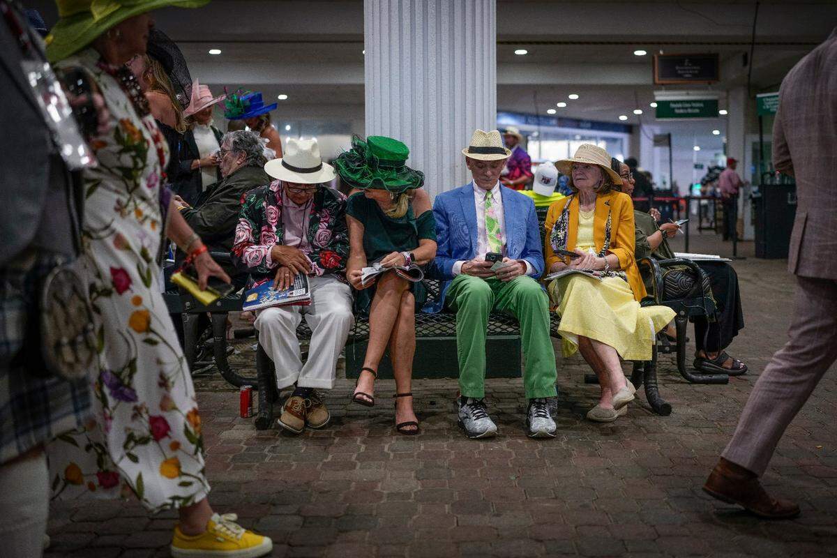 Spectators in spring colors sit at Churchill Downs on Derby Day, Saturday, May 6, 2023, in Louisville, Ky. (For the Herald Leader/Bryan Woolston)