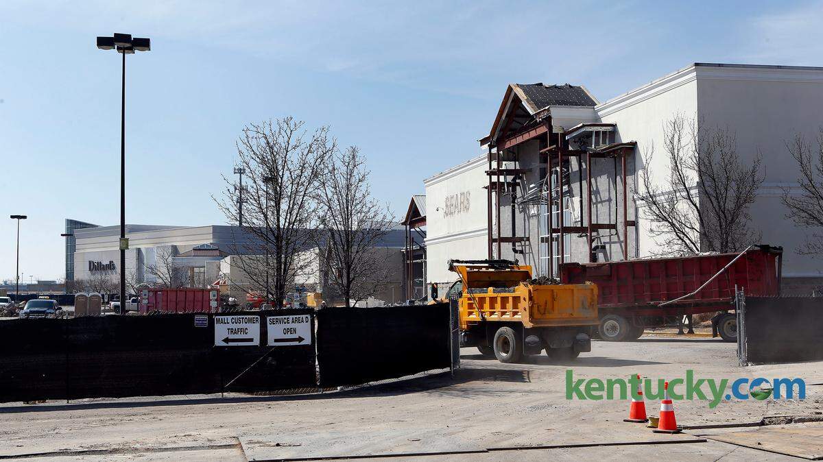 Work continued on the demolition/conversion of the former Sears store at Fayette Mall, 3401 Nicholasville Rd. in Lexington, Ky., Monday, March 8, 2014.  The 150,000 square foot Sears, which closed in January, was an anchor for the original mall, built in 1971. When the south wing was added in 1993, the store became a pass-through between the original and new sections of the mall. A new covered hallway has been constructed to allow patrons access to the entire mall. Part of the new hallway goes through a section of the old Sears and part goes outside. Photo by Charles Bertram | Staff