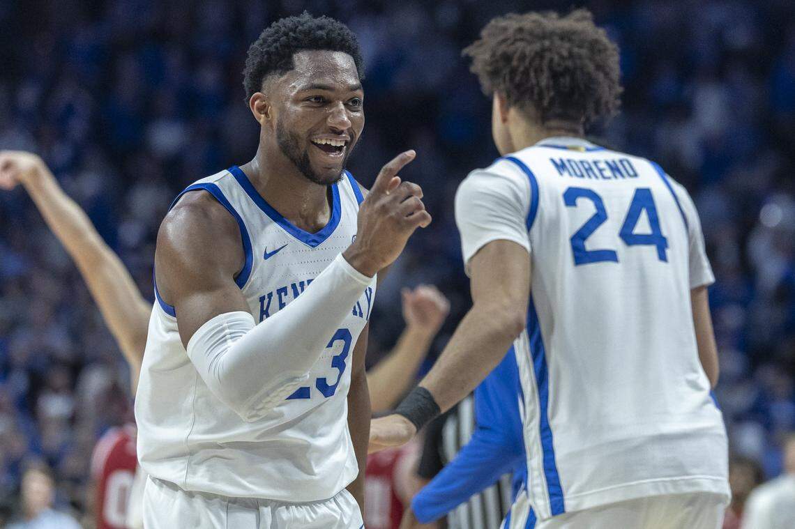 Kentucky basketball forward Mouhamed Dioubate (23) celebrates with teammate Malachi Moreno (24) after scoring during a game against Indiana at Rupp Arena in Lexington, Ky., on Saturday, Dec. 13, 2025.