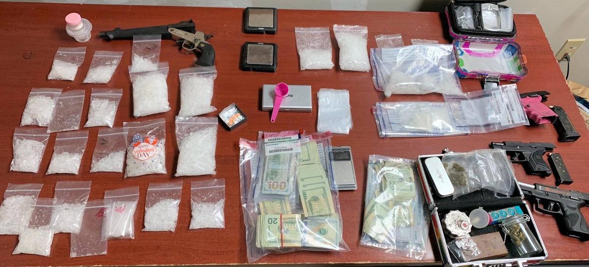 The Laurel County Sheriff’s Office released photos of drugs, guns and money found in a playhouse late Sunday night.