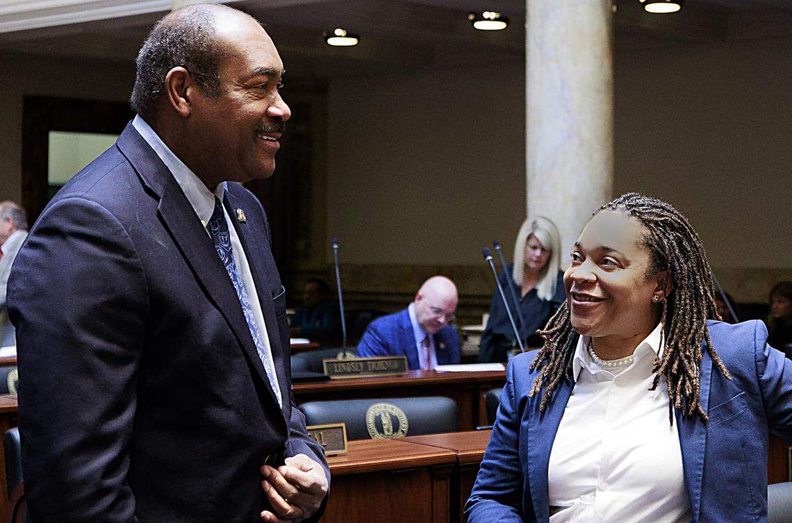 Sen. Donald Douglas, R-Nicholasville, confers with Sen. Keturah Herron, D-Louisville, on the Senate floor before the start of the 2025 legislative session.