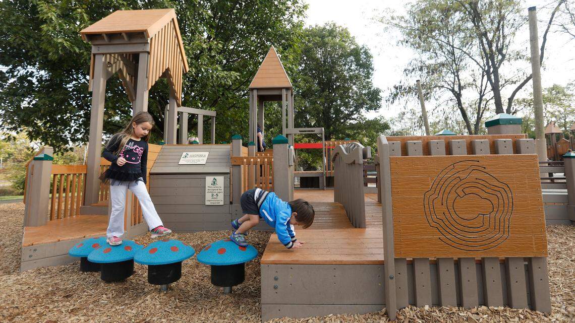 Children played at Shillito Park playground during the ribbon cutting on Monday, Oct. 21, 2019. 
