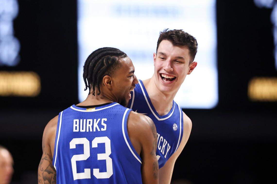 Kentucky’s Jordan Burks and Zvonimir Ivisic celebrate after the Wildcats’ 109-77 defeat of Vanderbilt on Tuesday night at Memorial Gymnasium in Nashville, Tennessee.