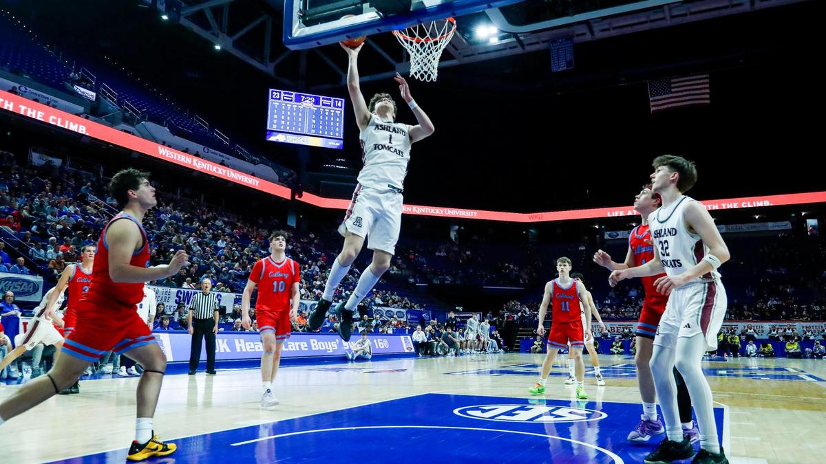 Ashland Blazer’s Zander Carter (1) drives in for a layup during the Tomcats’ 81-64 win over Calloway County on opening day of the Boys’ Sweet 16 in Rupp Arena. Carter scored a game-high 29 points.