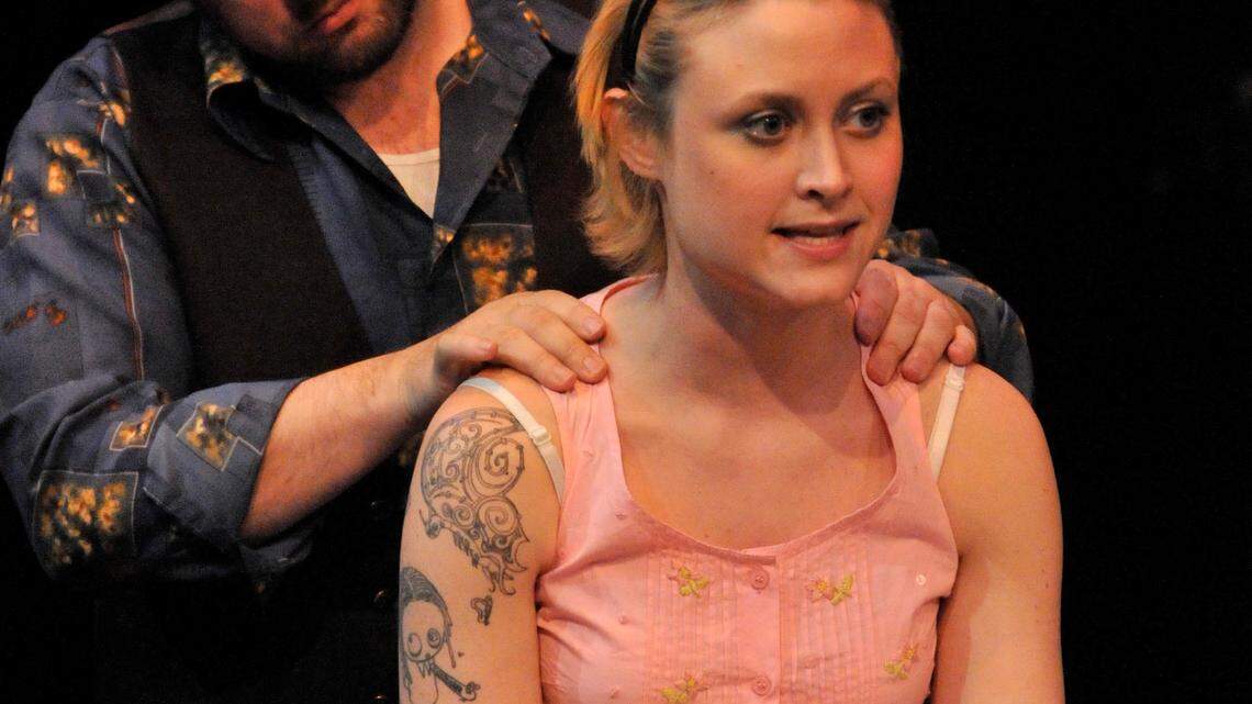 Bill (Bob Martin) and The Girl (Heather Porter) talk at the beginning of the day. Project See Theatre presents Langford Wilson's 'The Hot l Baltimore," March 1-11 at the Downtown Art Center in Lexington, Ky. This picture was taken at a dress rehearsal Feb. 28, 2012. Photo by Rich Copley| Lexington Herald-Leader