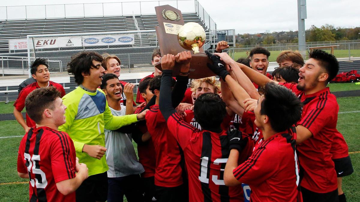Paul Laurence Dunbar celebrates after defeating Covington Catholic last fall for the school’s fifth boys’ soccer state championship. The Bulldogs graduated 12 seniors, including six starters, off that team.
