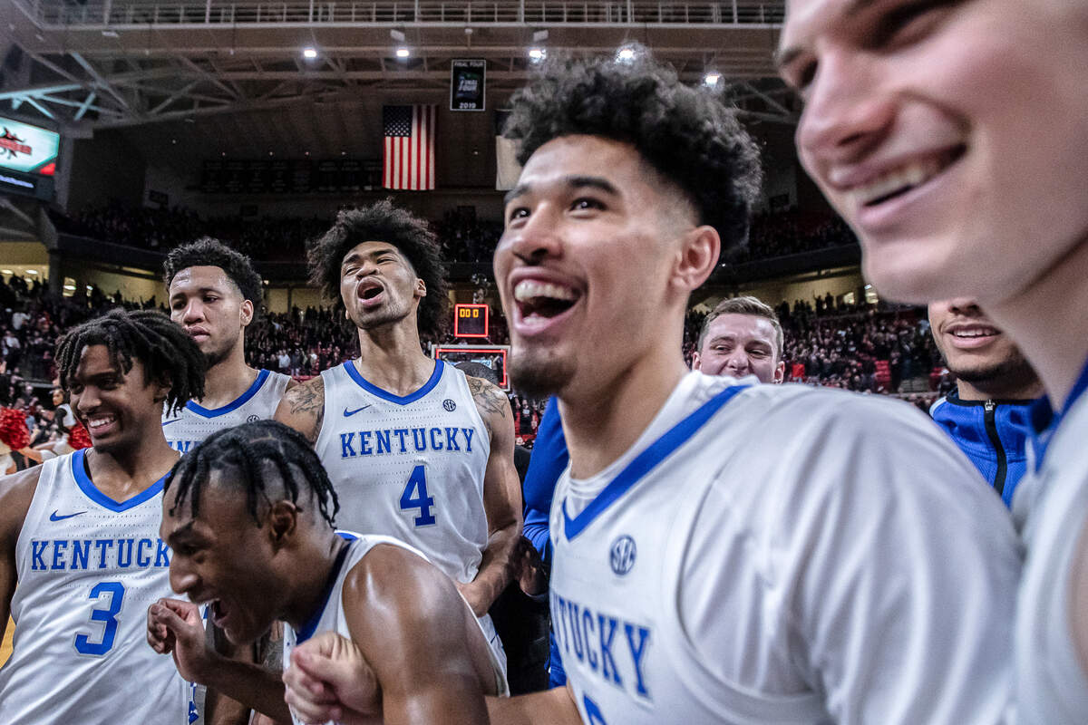 Kentucky players celebrate after defeating Texas Tech in overtime during a game at United Supermarkets Arena in Lubbock, Texas, Saturday, Jan. 25, 2020.