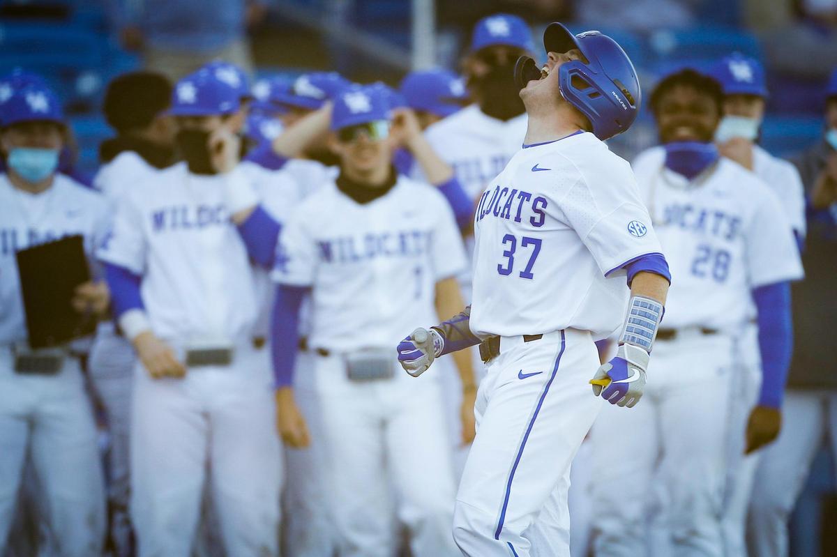 Former Scott County High School standout Cam Hill (37) celebrated after hitting one of Kentucky’s three first-inning home runs on Tuesday.