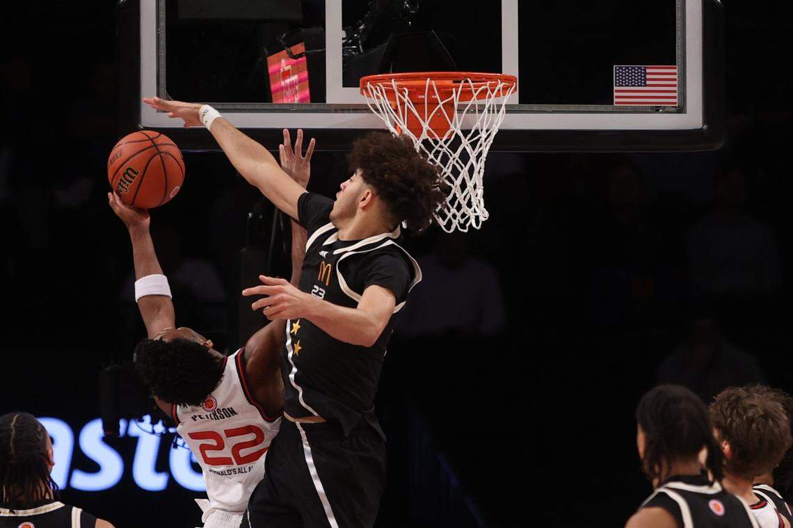 Kentucky signee Malachi Moreno, playing for the East squad in Tuesday night’s McDonald’s All-American Game in Brooklyn, blocks a shot by Kansas recruit Darryn Peterson. Moreno finished the game with two blocked shots along with nine points and five rebounds in 16 minutes.