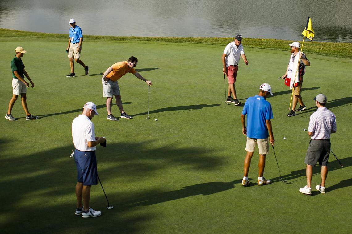 Golfers gather on the 9th green during the PGA Barbasol Championship pro-am at Keene Trace Golf Club’s Champions Course in Nicholasville, Ky., Wednesday, July 17, 2019.