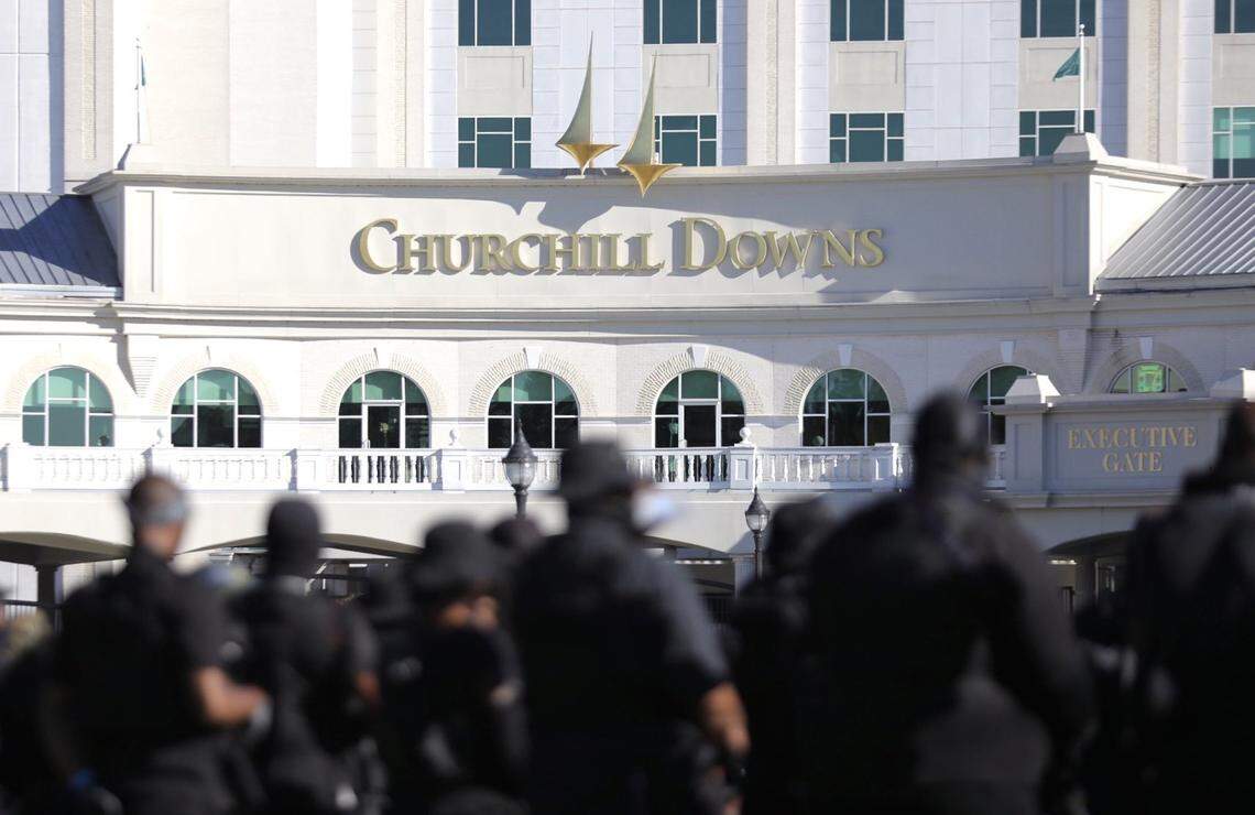 Members of the NFAC lined up out in front of Churchill Downs in Louisville on Derby Day.