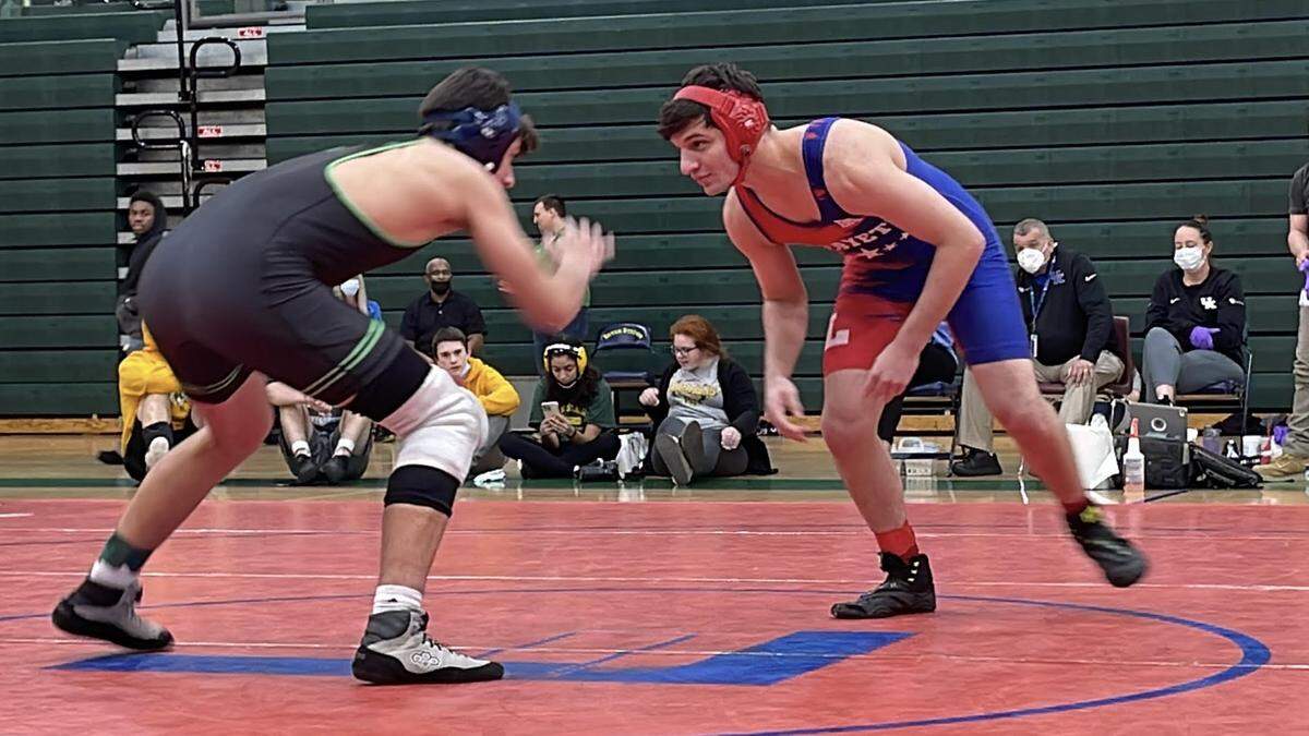 Lafayette’s Brayden Giannone, right, squared up against Great Crossing’s Joshua Strayer in the 165-pound class at the Region 6 Wrestling Championships. Giannone, a former state champion, won by fall and was named the meet’s most outstanding wrestler.