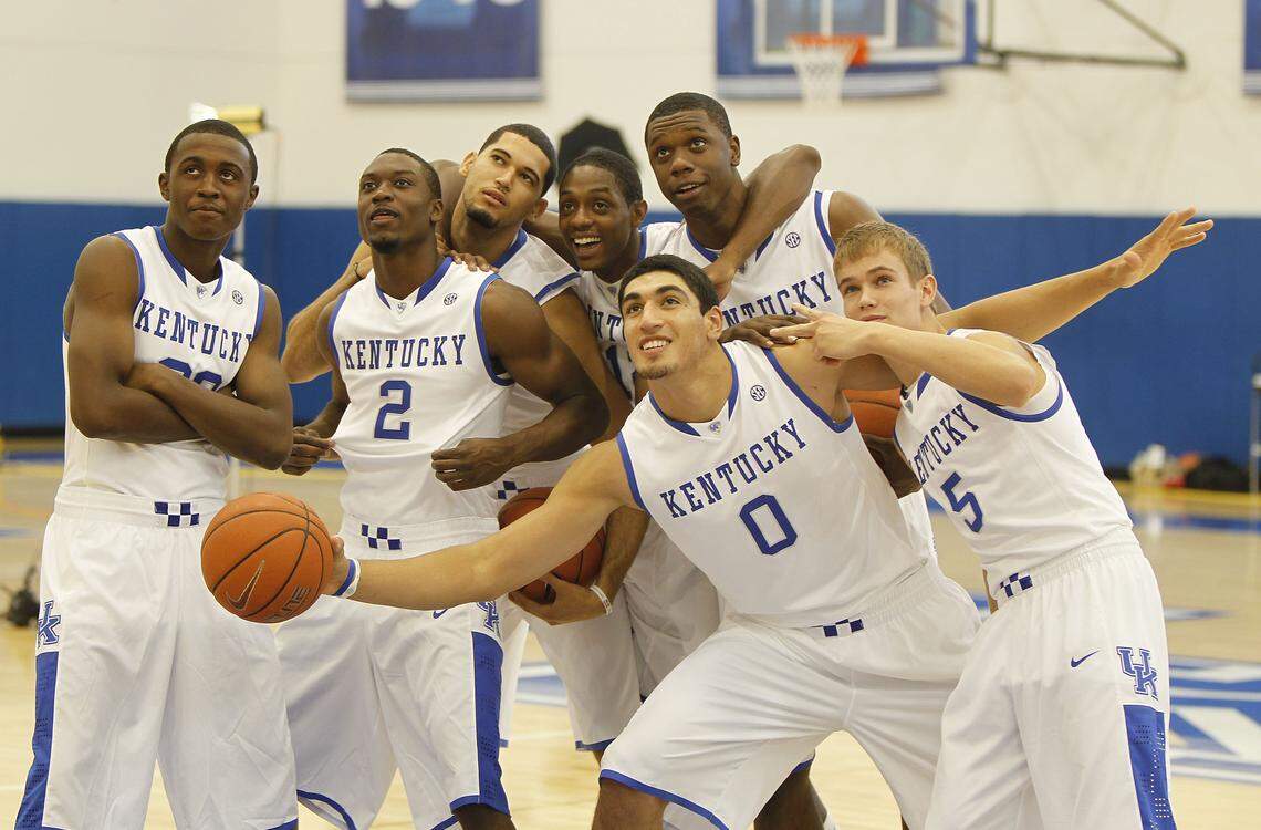 Another subtle checkerboard appears on pants: Clowning for a photographer from left are, Doron Lamb, Stacey Poole, Eloy Vargas, Brandon Knight, Enes Kanter, Terrence Jones and Jarrod Polson, during the University of Kentucky basketball team photo day held in the Joe Craft Center on the UK campus on Sept. 2, 2010.