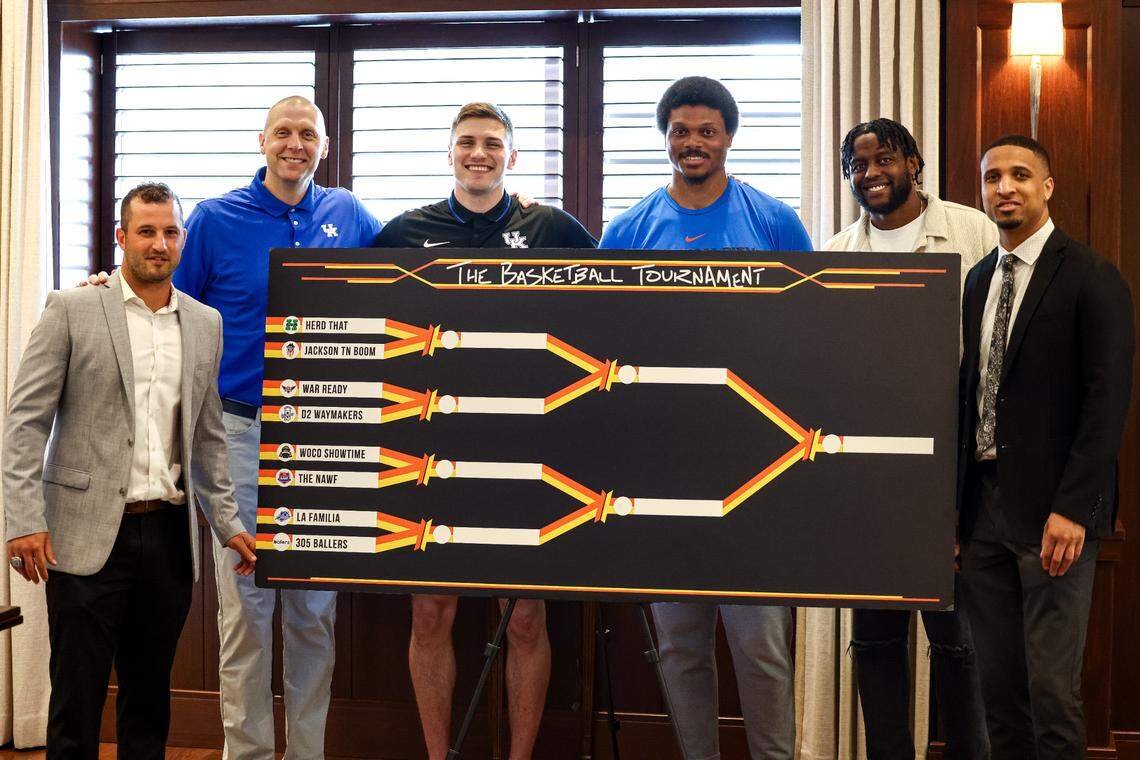 From left, Sam Malone, UK coach Mark Pope, Nate Sestina, Daniel Orton, Darius Miller and Twany Beckham pose with the Lexington TBT regional bracket Wednesday.