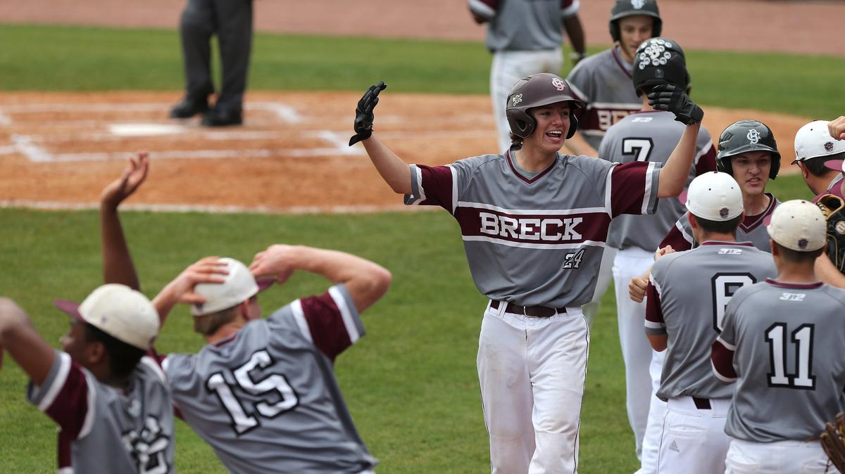 Breckinridge County’s Cole Tabor celebrated after scoring on a Beechwood error Thursday in the Fighting Tigers’ 10-6 win in the Whitaker Bank/KHSAA State Baseball Tournament.