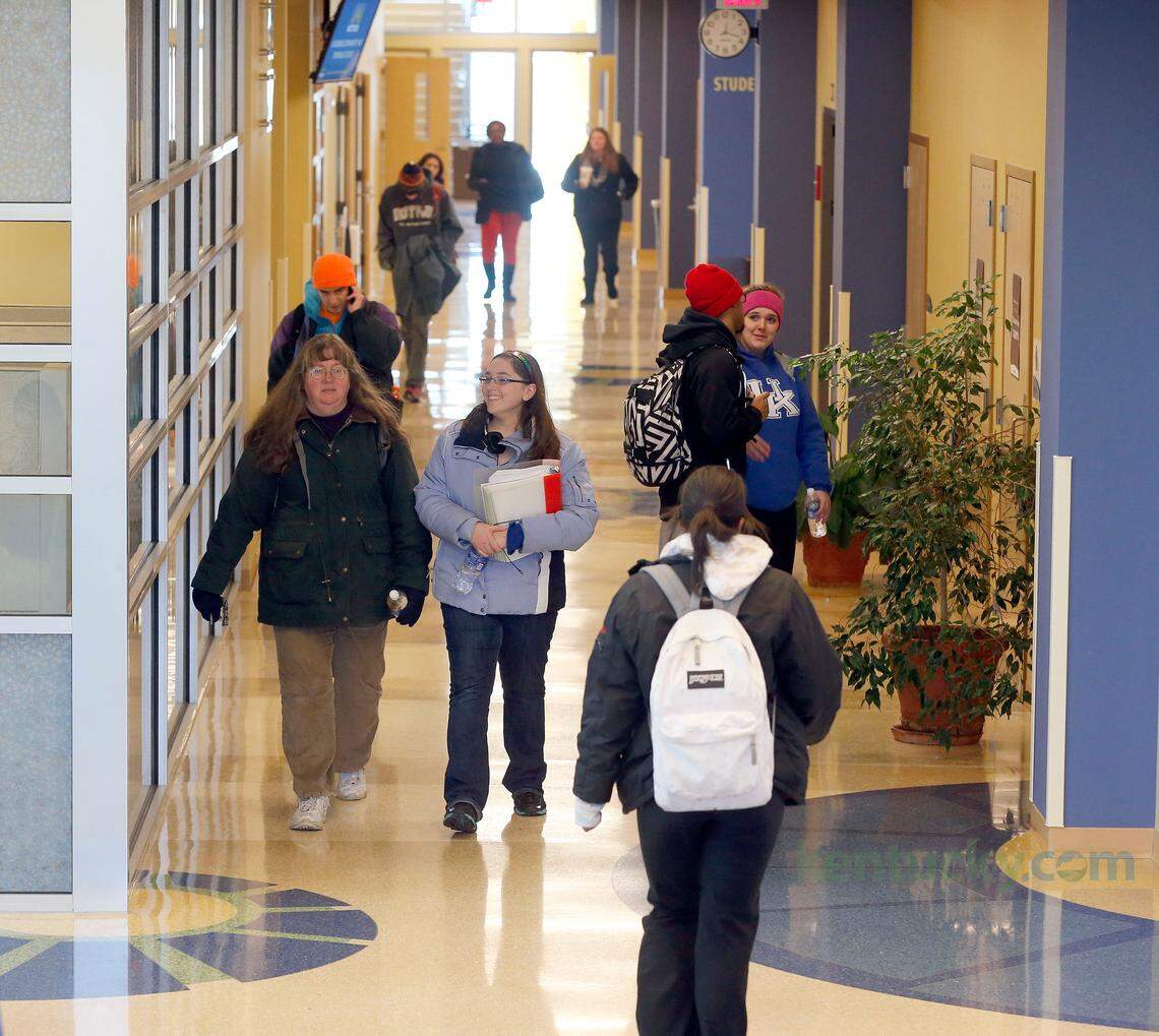 Students in the classroom building hallway at the Bluegrass Community and Technical College Newtown Campus, at 4th St. and Newtown Pike in Lexington, Ky., Thursday, January 23, 2014. For the first time in its 15-year fee, KCTCS will impose a mandatory fee on its students in order to build new buildings. The $8 dollar per credit fee will mean the average student pays about $72 a semester to pay off $145 million in agency bonds the governor has proposed authorizing in his budget. Photo by Charles Bertram | Staff