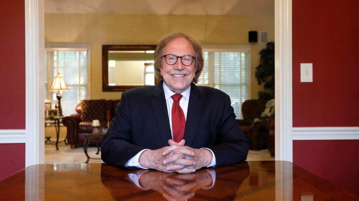 Bruce Simpson smiles for a portrait on Wednesday, Aug. 9, 2023 at his home in Lexington, Ky.