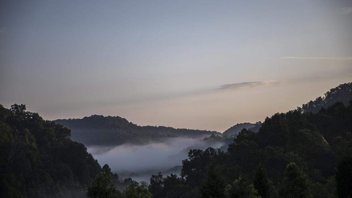 Dawn breaks in the Daniel Boone National Forest on Saturday, July 6, 2019.