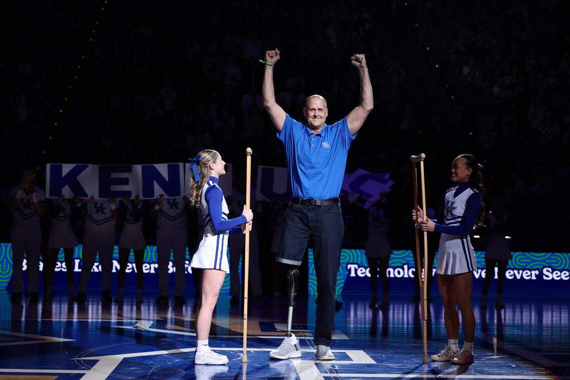 Former Kentucky basketball player Todd Svoboda performed the “Y” during the Wildcats’ win over Colgate in Rupp Arena last season. Svoboda, who played for UK in 1992-93, had his right leg amputated last summer after an infection.