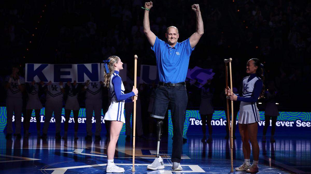 A rousing cheer for a former Wildcat who had leg amputated last summer