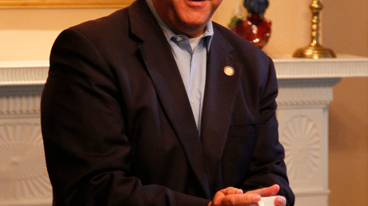Sen. David Williams, the Republican nominee for governor  warmed up his hands on a cup of coffee as he   met business and community leaders and discuss his jobs plan on Thursday October 19, 2011  in Versailles, Ky.  Photo by Mark Cornelison | Staff