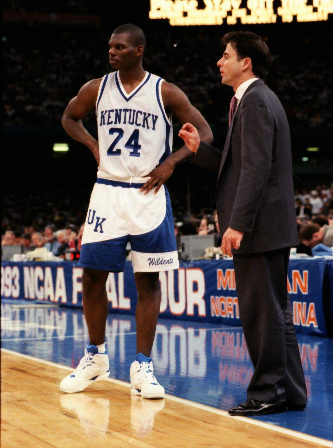Jamal Mashburn and UK Coach Rick Pitino met on the sideline during Kentucky’s game against Michigan in the 1993 NCAA Final Four in New Orleans.