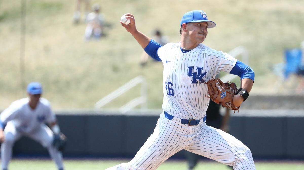 Kentucky’s Austin Strickland delivers a pitch against West Virginia in the NCAA Tournament’s Lexington Regional on Sunday afternoon.