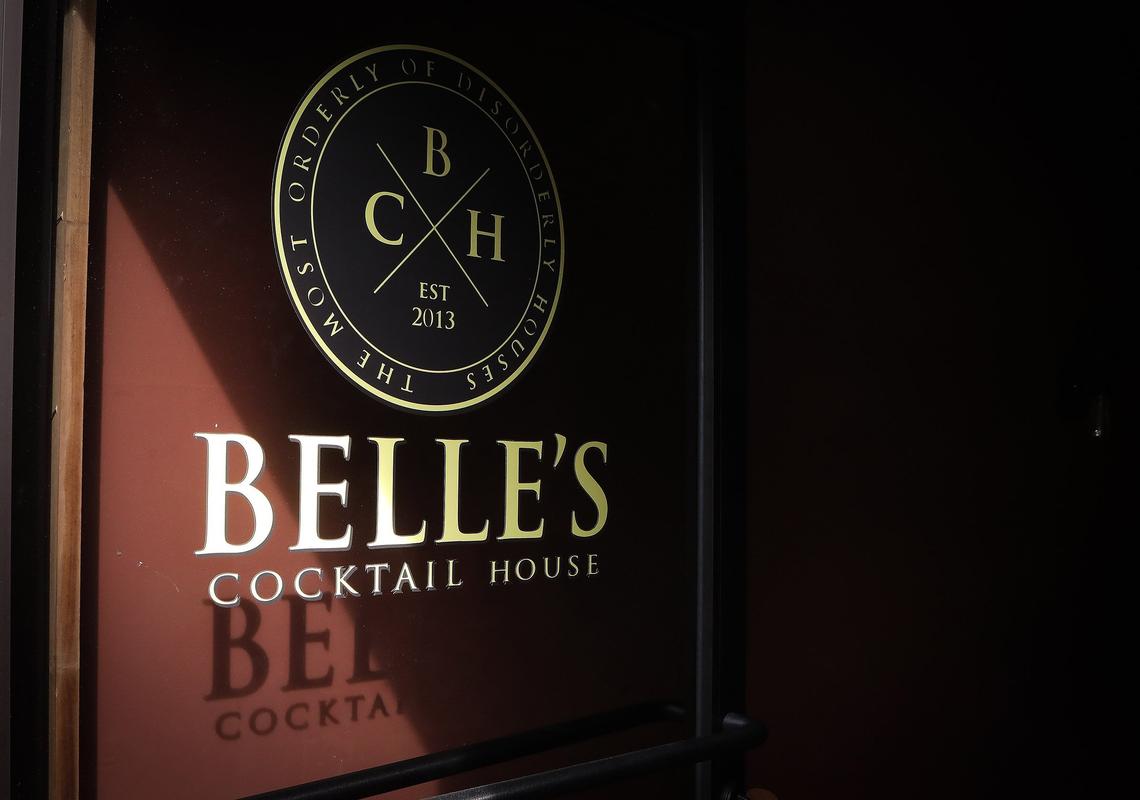 Shadows and sign Wednesday at Belle’s Cocktail House.