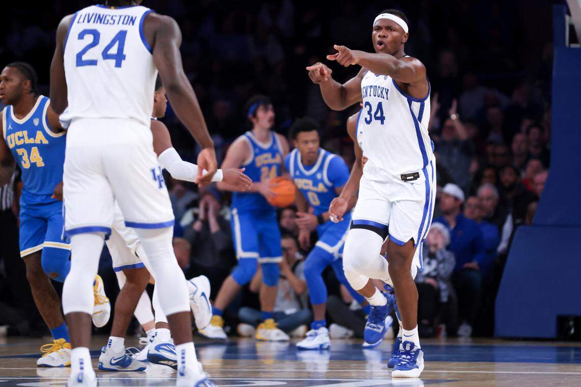 Kentucky forward Oscar Tshiebwe (34) reacts during his team’s game against UCLA in the CBS Sports Classic on Saturday in New York. Tshiebwe was limited to eight points and the Bruins won 63-53.