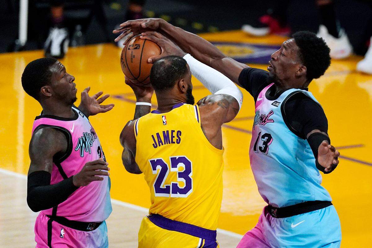 The Lakers’ LeBron James, center, had his shot blocked by the Heat’s Bam Adebayo, right, as guard Kendrick Nunn also defended on Feb. 20. Adebayo was named an All-Star for the first time last season but did not make the cut this year.
