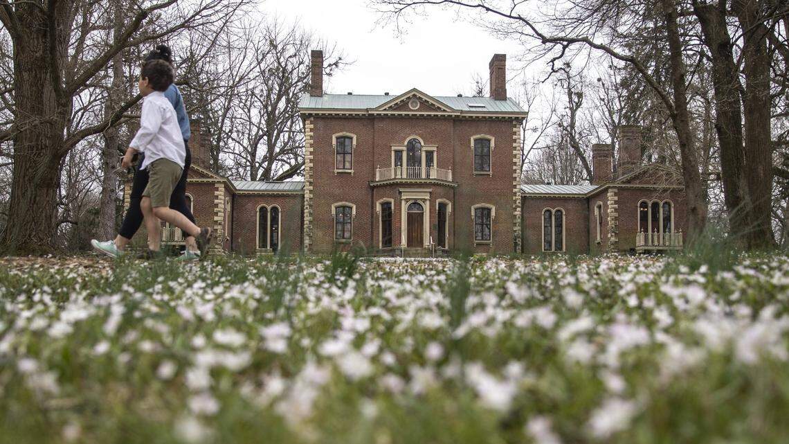 People walk along the trails at Ashland Ð the Henry Clay Estate in Lexington, Ky., on Tuesday, March 24, 2020. The Ashland house is closed, but the grounds and formal gardens remain open to the public.