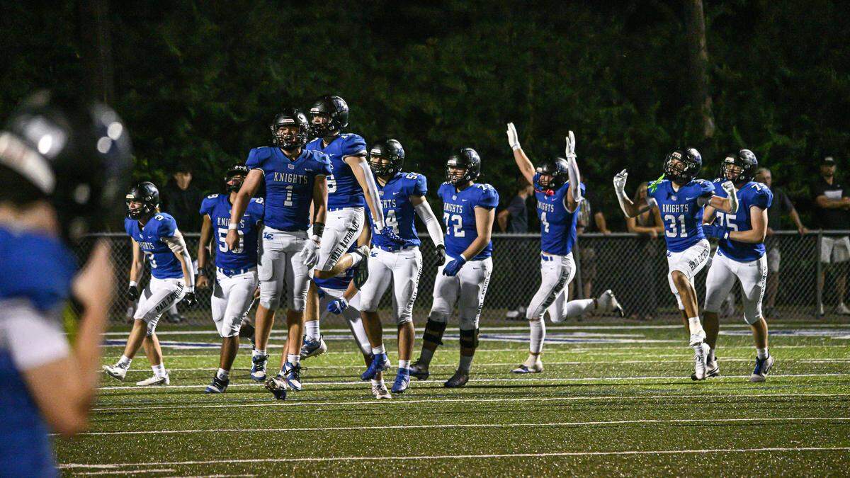 Lexington Catholic players celebrated as the final seconds wound down in their 17-7 victory over Boyle County at Lexington Catholic High School on Friday.