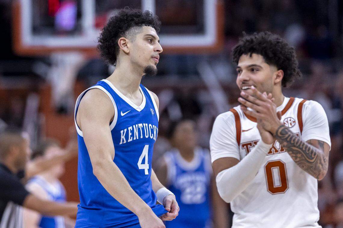 Kentucky guard Koby Brea (4) and Texas guard Jordan Pope (0) react during Saturday’s game at the Moody Center in Austin, Texas.