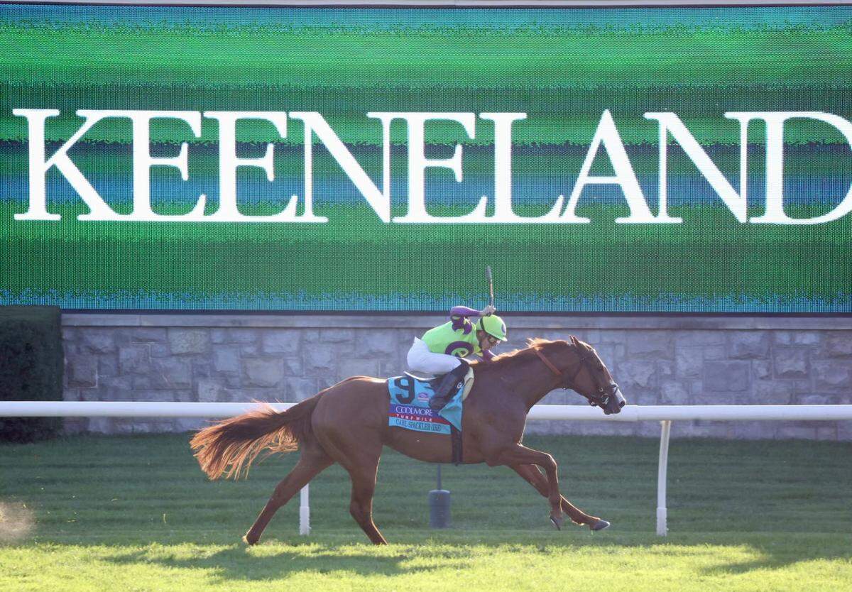 Carl Spackler, with Tyler Gaffalione up, wins the Grade 1, $1.25 million Coolmore Turf Mile at Keeneland on Saturday.
