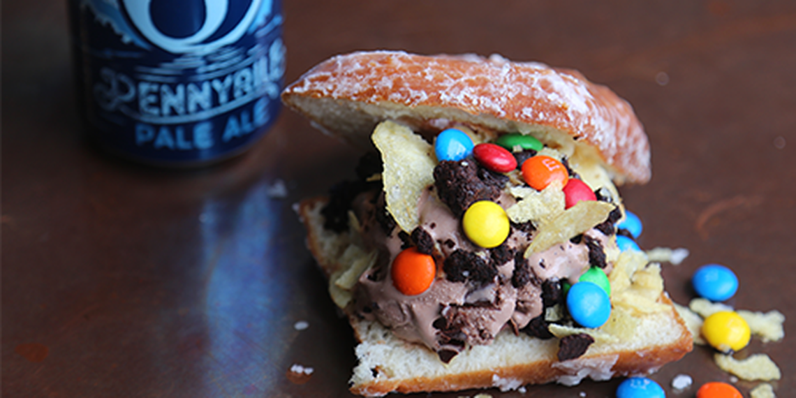 Crank & Boom’s dark chocolate truffle ice cream was featured in a 2019 Lexington Burger Week treat, made with  brownie crumbs, potato chip crumbles and candy-coated chocolates on a glazed doughnut.