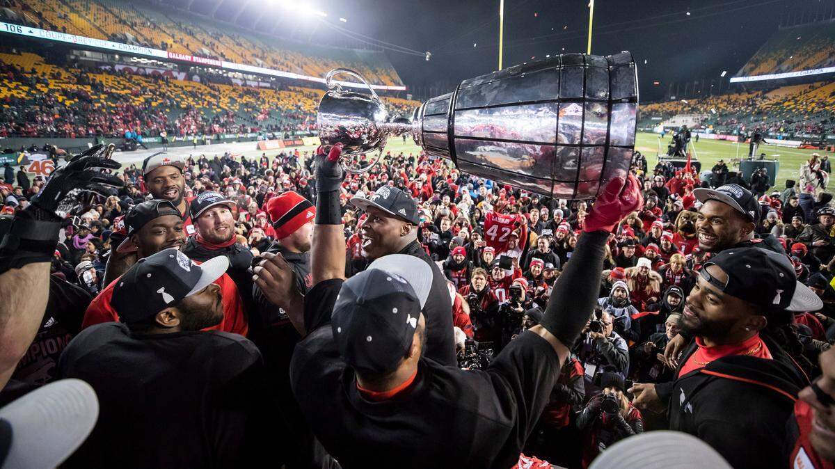 The Calgary Stampeders celebrated with the Grey Cup after defeating the Ottawa Redblacks in the Canadian Football League championship game in Edmonton, Alberta, on Sunday night.