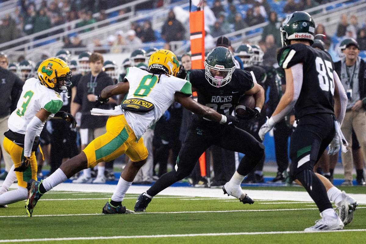 Clinton Sansbury (23) paced Trinity’s ground game with 155 yards and three touchdowns on Saturday.