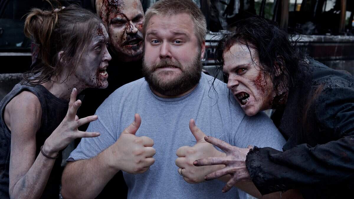  Kentuckian Robert  Kirkman, center, writes The Walking Dead comic strip series, which AMC has turned into a TV series that debuts Sunday.  