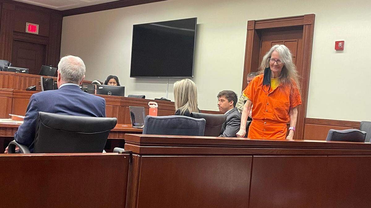 Carol Ann Hignite, 74, walks into a courtroom for a bond hearing on February 23, 2023.