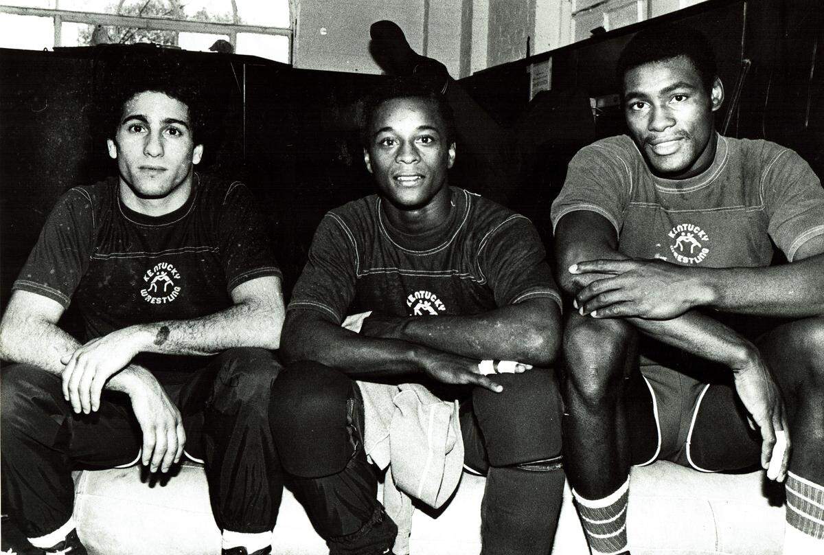 James Johnson, right, posed for a photo in 1979 with UK teammates Ricky Dellagatta, left, and Reggie Burke.