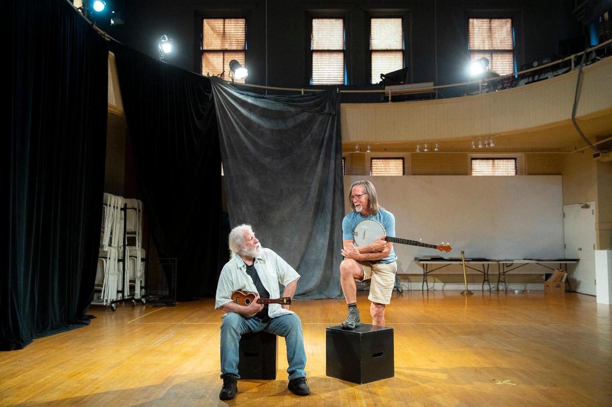 Red Barn Radio founder and executive producer Ed Commons, left, and host and associate producer Brad Becker pose for a portrait in the room where the weekly show is produced at ArtsPlace in downtown Lexington, Ky., on Friday, Aug 27, 2021.