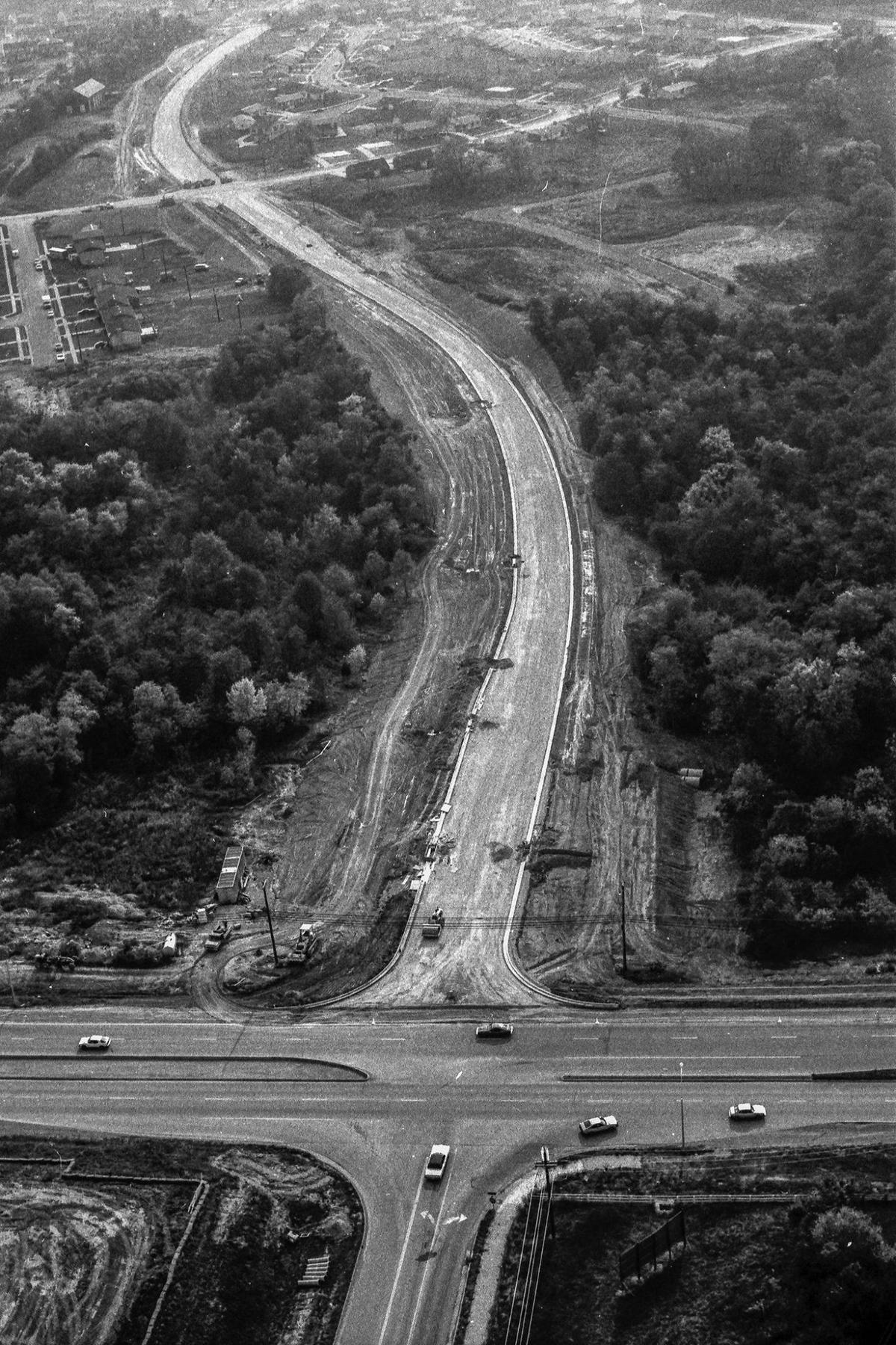 Construction of Man o’ War Boulevard, running from top to bottom of the picture, intersecting with Richmond Road in Lexington on Oct. 4, 1982. Man o’ War was completed and widened in segments over 15 years. The segment shown here extended Man o’ War 1.1 miles from Richmond Road to Mount Tabor Road, now known as Alumni Drive.