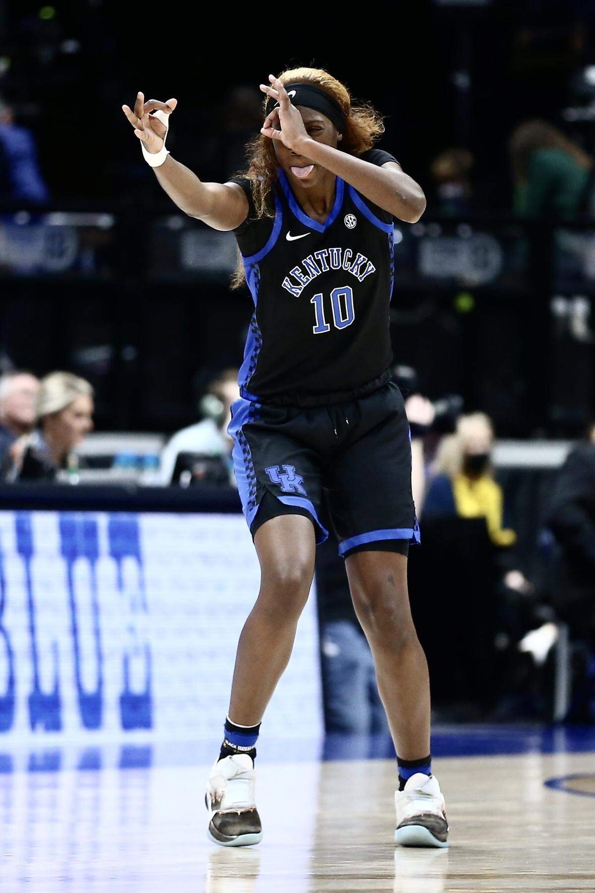 Kentucky senior guard Rhyne Howard celebrates after making a three-pointer during Kentucky’s SEC Tournament quarterfinal game against LSU on Friday night at Bridgestone Arena in Nashville, Tennessee.