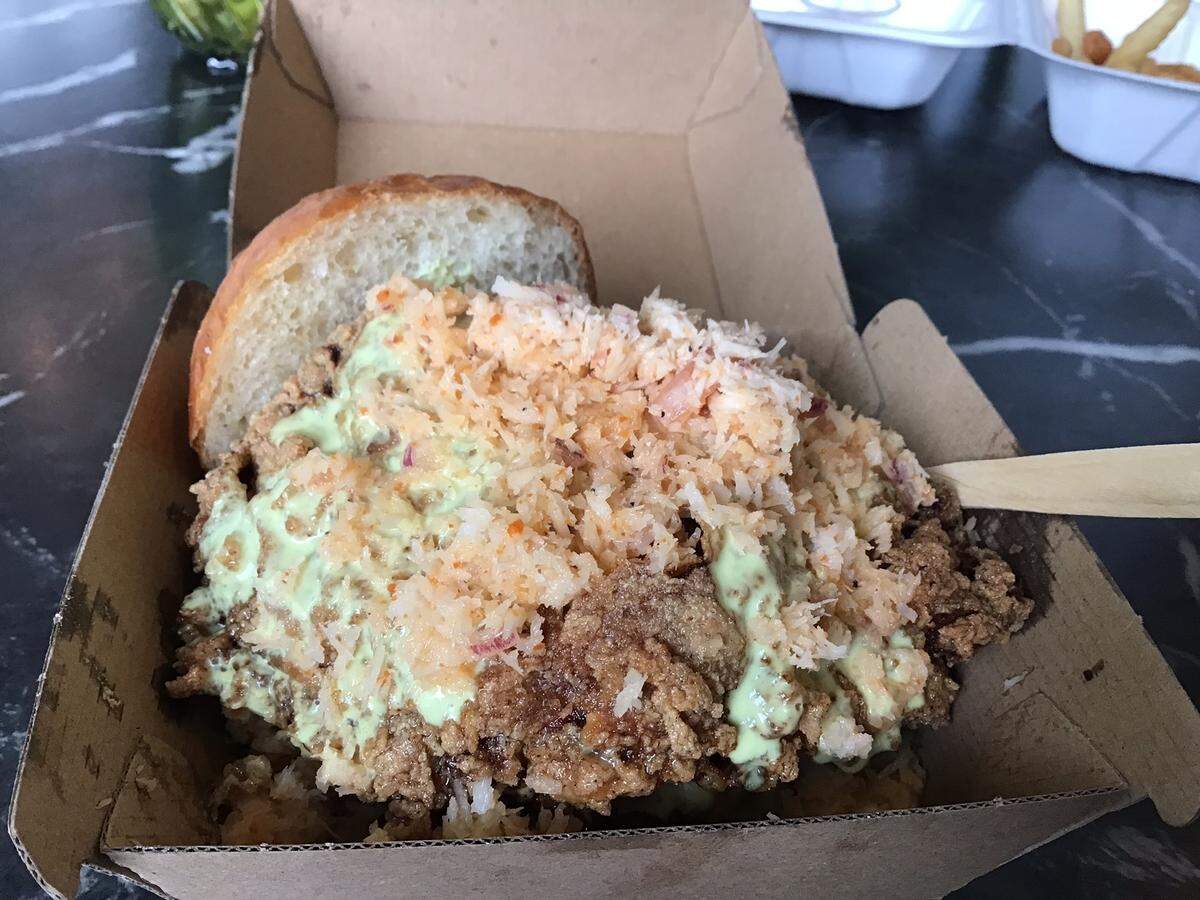 Tuk Tuk Snack Shop’s lunch menu features sandwiches including The Webster made with fried chicken or jackfruit, shredded coconut, coco sauch, housemade Hawaiian roll and fries.