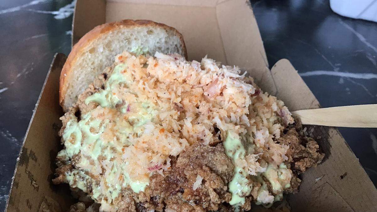 Tuk Tuk Snack Shop’s lunch menu features sandwiches including The Webster made with fried chicken or jackfruit, shredded coconut, coco sauch, housemade Hawaiian roll and fries.