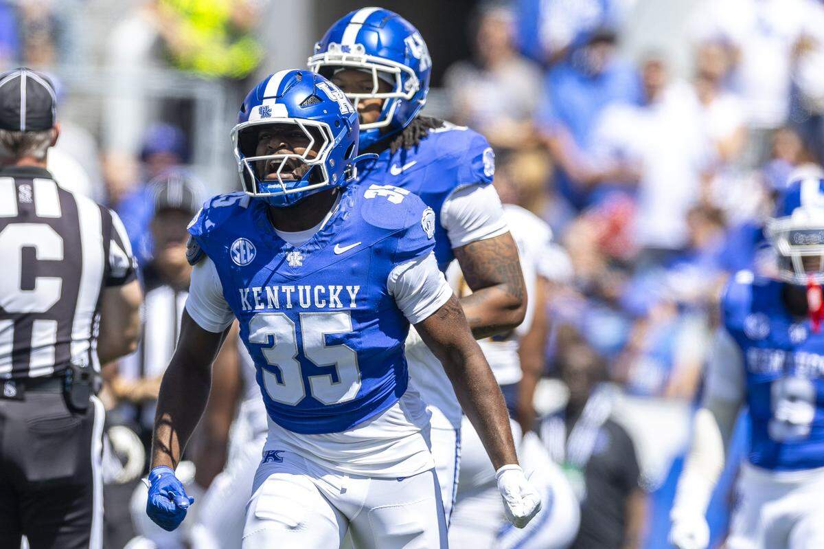 Kentucky linebacker Steven Soles Jr. reacts after deflecting a Toledo pass during Saturday’s game at Kroger Field.