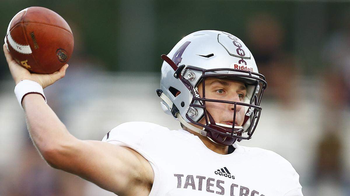 Tates Creek’s Luke Duby (4) passed during the Fayette County Kickoff Classic. On Thursday, Duby and the Commodores picked up their first win of the year, 37-14, over Paul Dunbar.